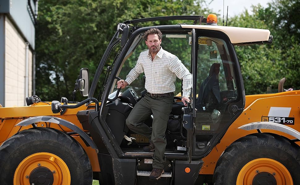 Melton shirt man on tractor