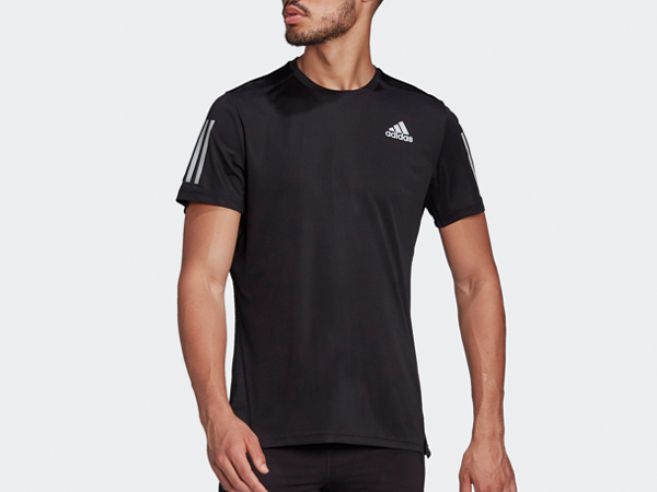 Close-up shot of male model wearing Adidas t-shirt