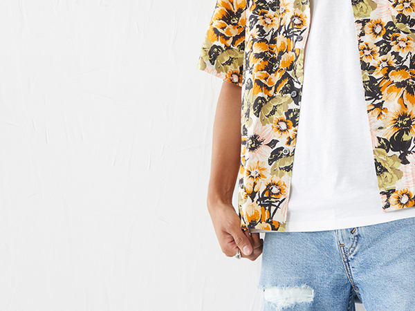 cropped image of model''s torso wearing hawaiin shirt